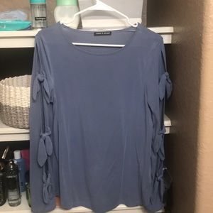 Blue shirt with long, knitted sleeves